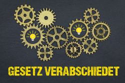 © magele-picture - stock.adobe.com Foto: Zahnräder über Schriftzug GESETZ VERABSCHIEDET